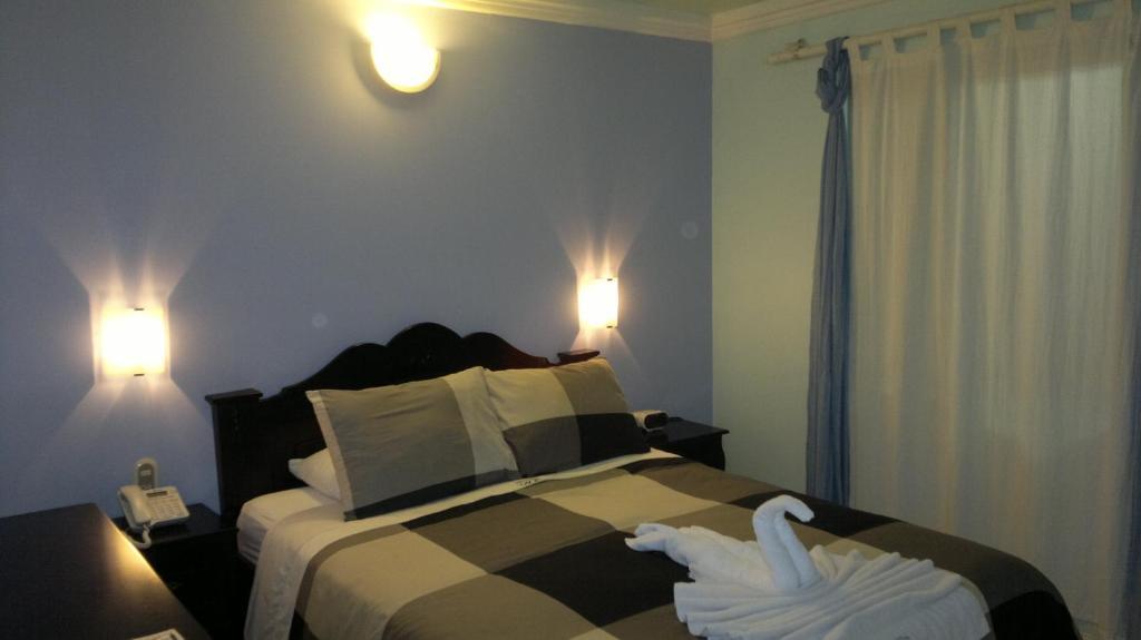 Hotel Eskalima Αλαχουέλα Δωμάτιο φωτογραφία