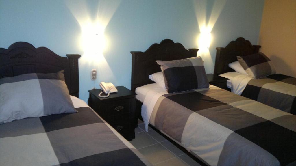 Hotel Eskalima Αλαχουέλα Δωμάτιο φωτογραφία